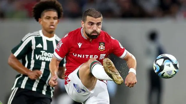 Wrexham’s Parkison Embraces Challenge of Facing Man Utd मैनचेस्टर यूनाइटेड के खिलाफ 'टेस्ट' के लिए तैयार रेक्सहैम कोच पार्किंसन
