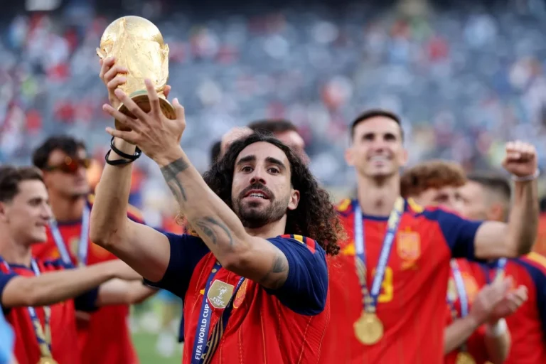 Marc Cucurella Follows Bizarre Tradition with Spain’s ‘Lucky Coin’ at World Cup Marc Cucurella Follows Bizarre Tradition with Spain's 'Lucky Coin' at World Cup