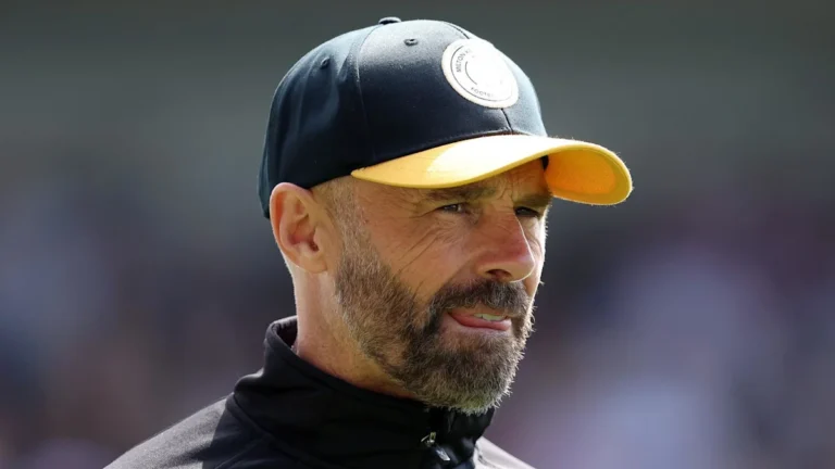 MK Dons Boss Warne Welcomes Pressure of Promotion Bid